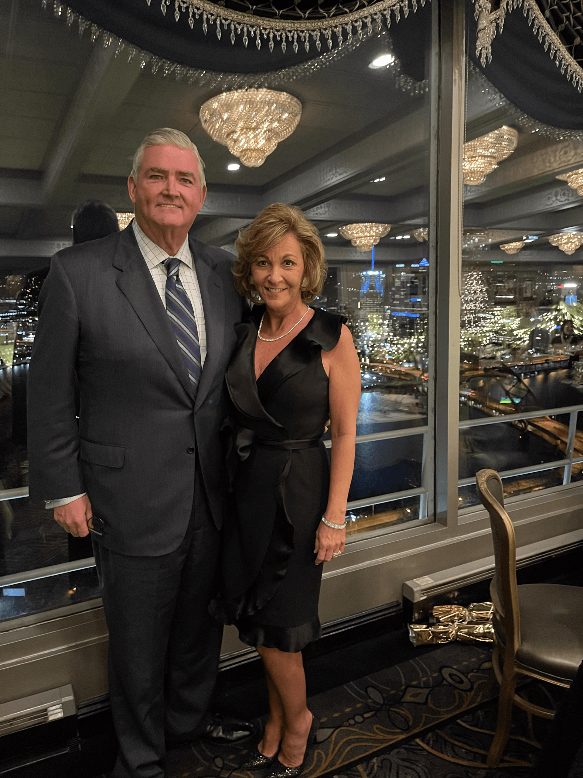 Joseph Gaydos and his wife posing at a charity event