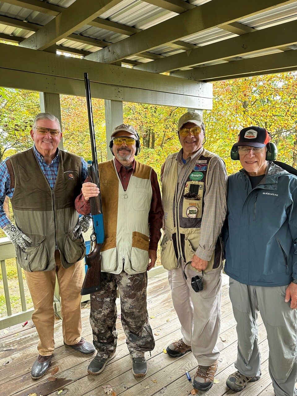 Joe Gaydos and members of the community participating in a charity shoot