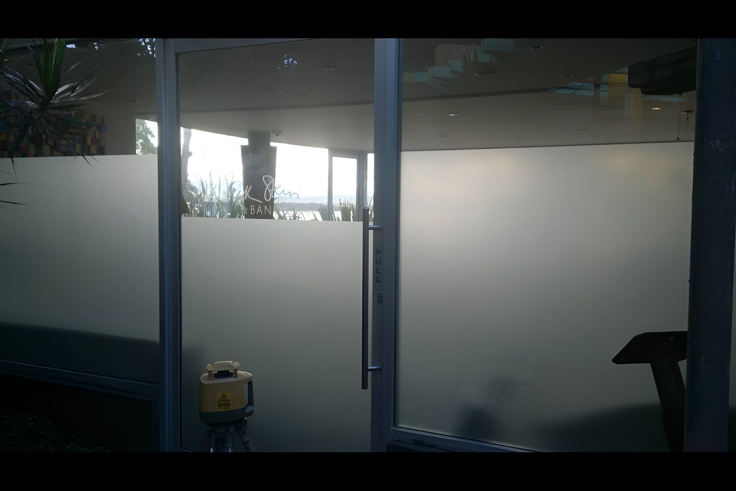 A Sliding Glass Door With Frosted Glass On It — Juz Tint In Moruya, NSW