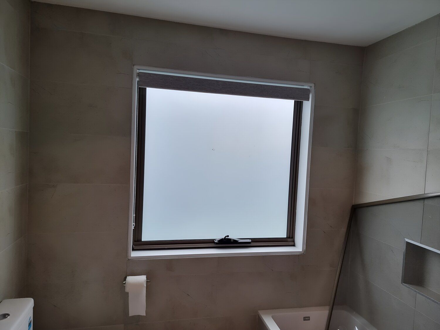 A Bathroom With A Window And A Toilet — Juz Tint In Batemans Bay, NSW