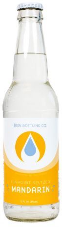 Clear glass bottle with white label and yellow-orange mandarin graphic, filled with transparent drink