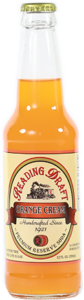 Orange glass bottle of sparkling cider with a cream and red label