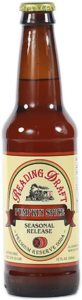 Bottle of Red Stripe beer with a white and red label on a brown glass bottle