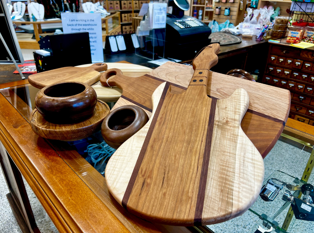 Wooden percussion instruments on a store counter in a music shop