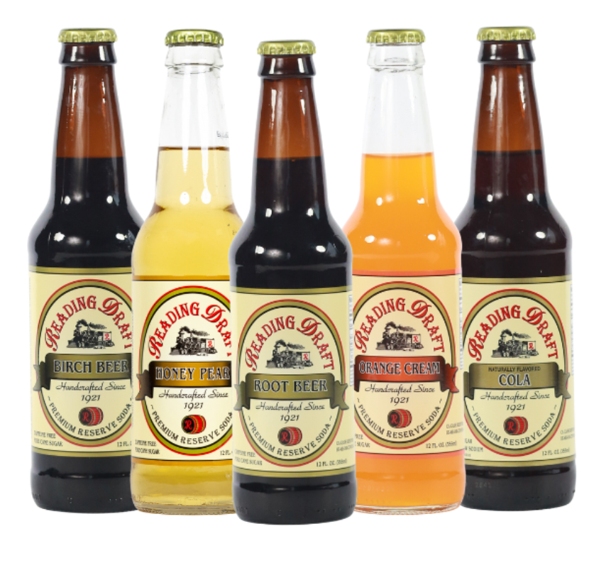 Five bottled beverages in brown, white, and orange glass with vintage-style labels on a white background