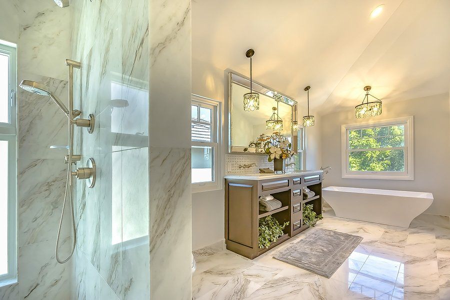 bathroom with chandelier