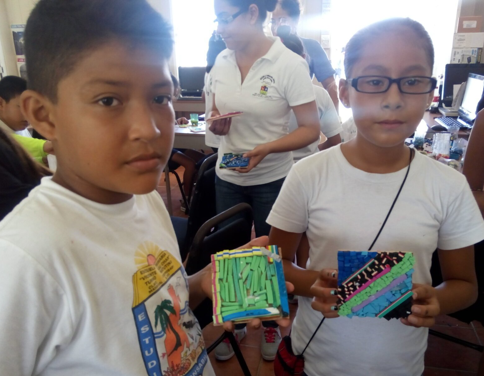 Children at flip-flop mosaic workshop