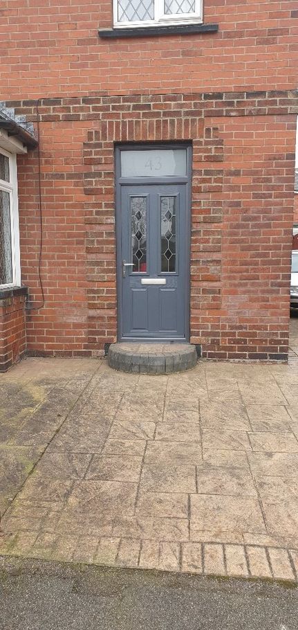 twin panel grey door with leaded diamonds