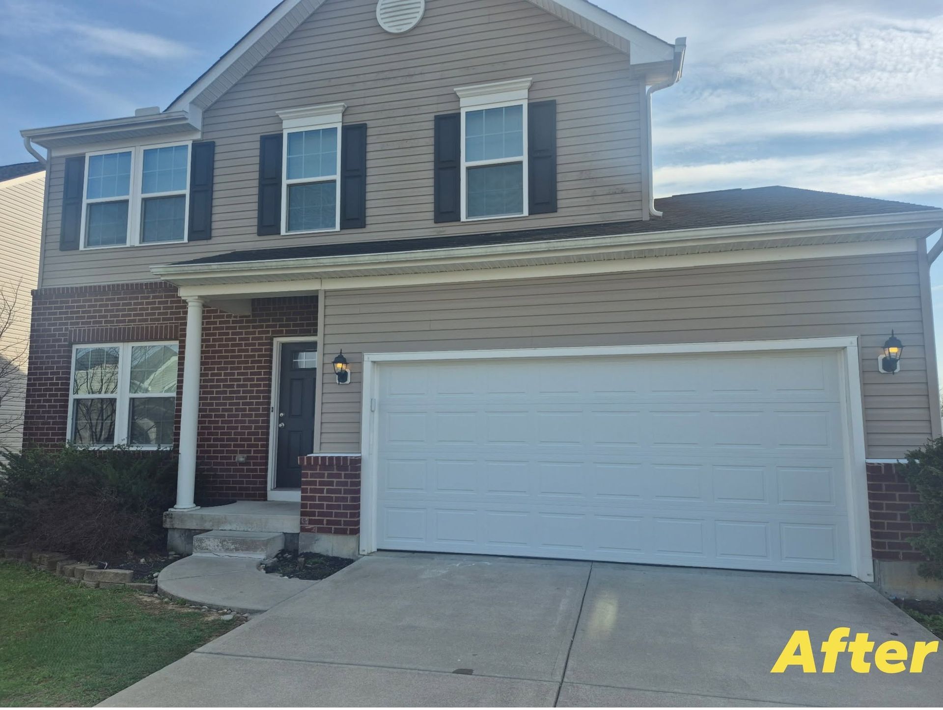 Two-story beige house with white garage door and brick entry, labeled “After”