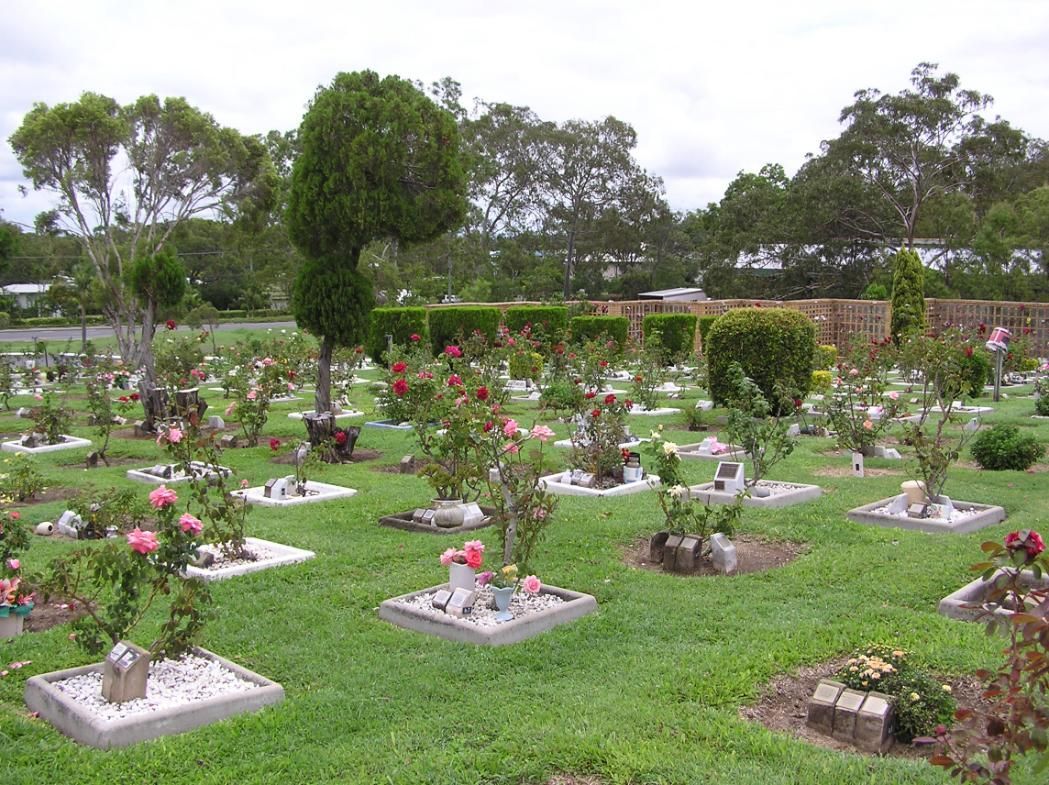 A Rose Garden in A Cemetery with Headstones and Manicured Bushes — Rockhampton Crematorium in Norman Gardens, QLD