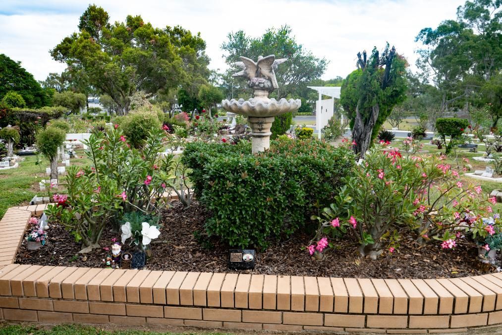 A Peaceful Garden Area in A Cemetery, Featuring a Brick — Rockhampton Crematorium in Norman Gardens, QLD