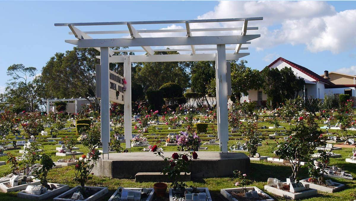 A Cemetery With A White Pergola In The Middle — Rockhampton Crematorium in Norman Gardens, QLD