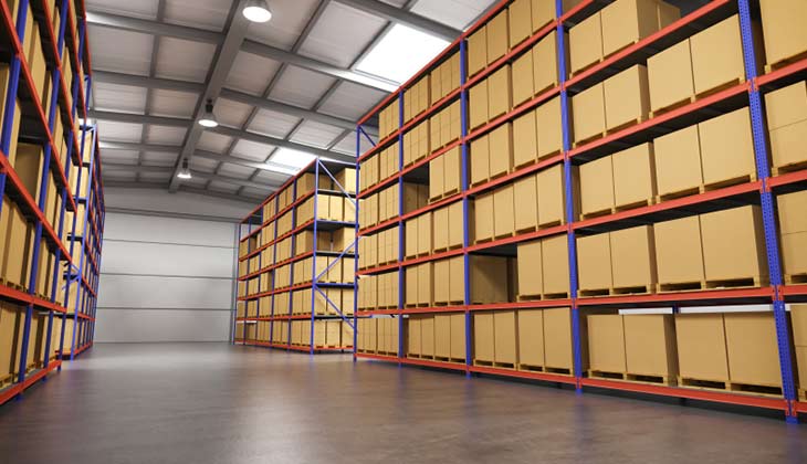 A large warehouse filled with lots of cardboard boxes on shelves.