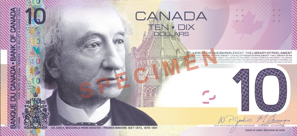 A canadian ten dollar bill with a picture of a man on it.