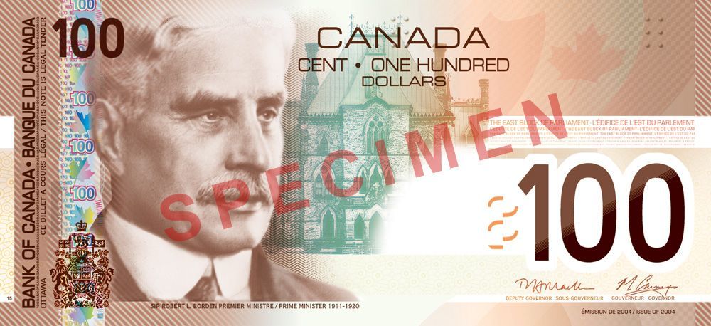 A 100 dollar bill from canada with a man on it