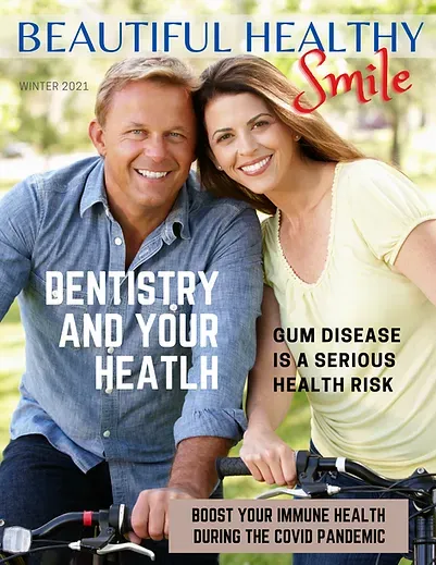 A man and a woman are on the cover of a magazine titled beautiful healthy smile.