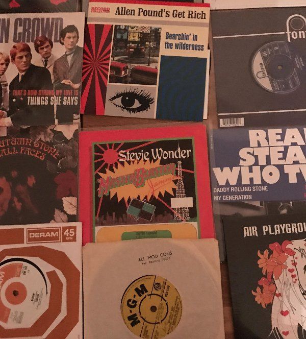 A collection of records including one by stevie wonder