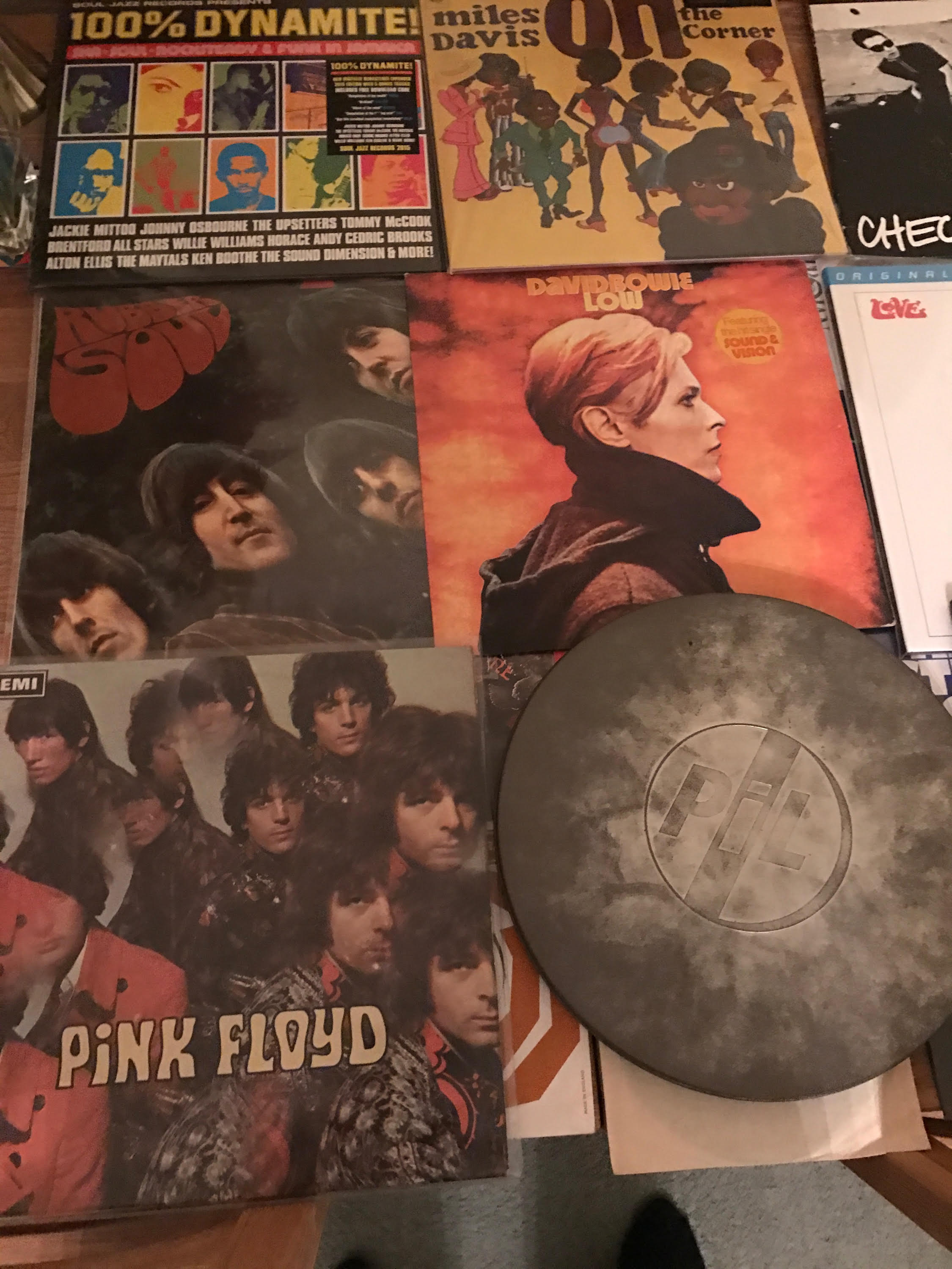 A collection of records including pink floyd and miles davis