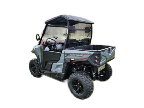 Black and gray UTV with roll cage and cargo bed, angled side view on white background