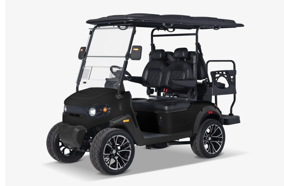 Black four-seat golf cart with roof and windshield on a white background