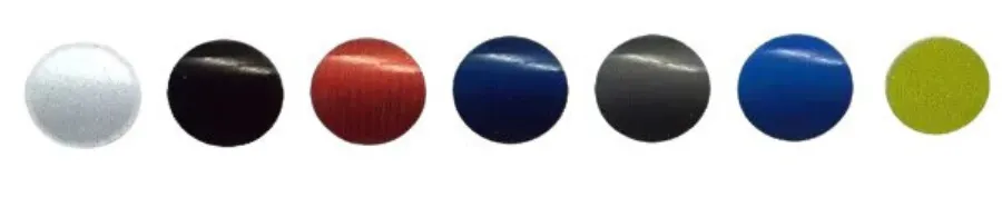 Seven glossy colored spheres in a row: white, black, red, dark blue, black, blue, and green.