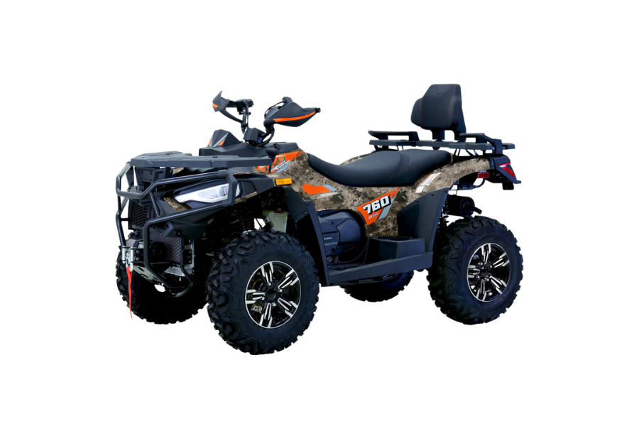 Black and orange ATV with cargo rack and large off-road tires on a white background