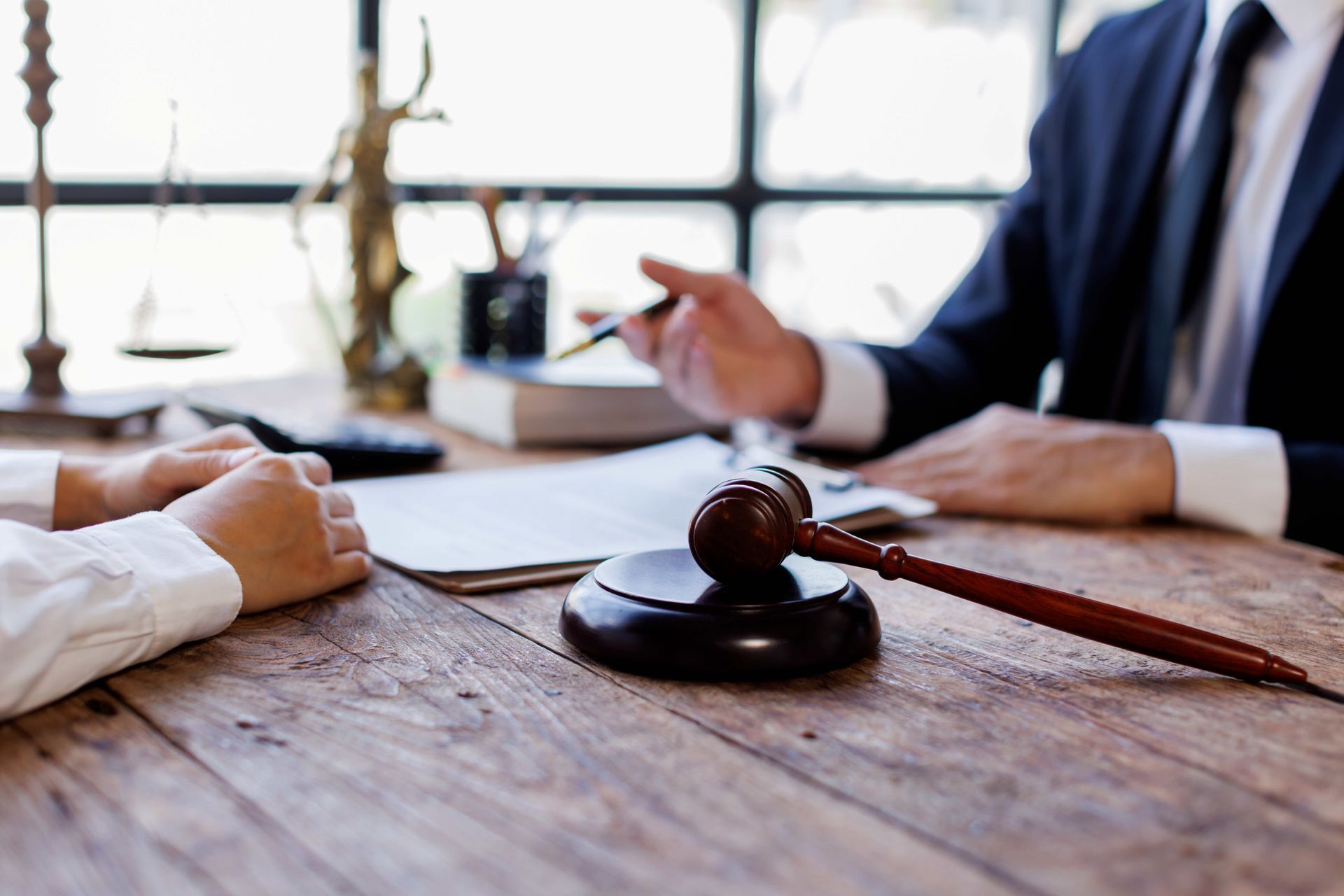 Personal injury attorneys consulting with clients about accident claims and legal representation. Personal injury attorneys consulting with clients about accident claims and legal representation.