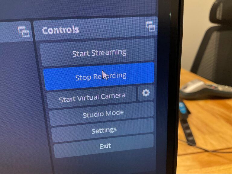 OBS Studio Controls panel with the blue “Stop Recording” button highlighted on a desk.