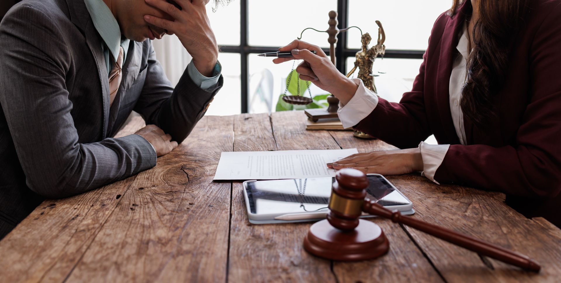 Legal Consultation, Businessman and lawyer discuss the Law contract document. Legal Consultation, Businessman and lawyer discuss the Law contract document.