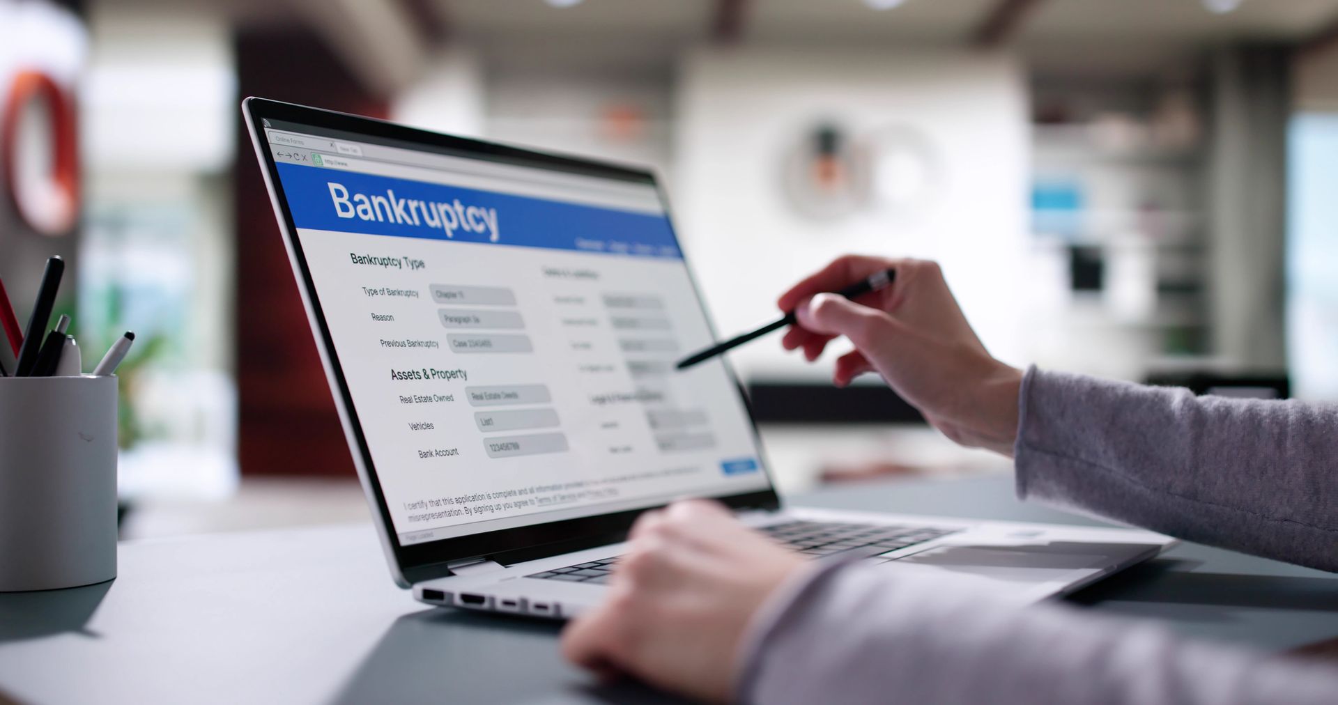 A lawyer is filling out a bankruptcy form.