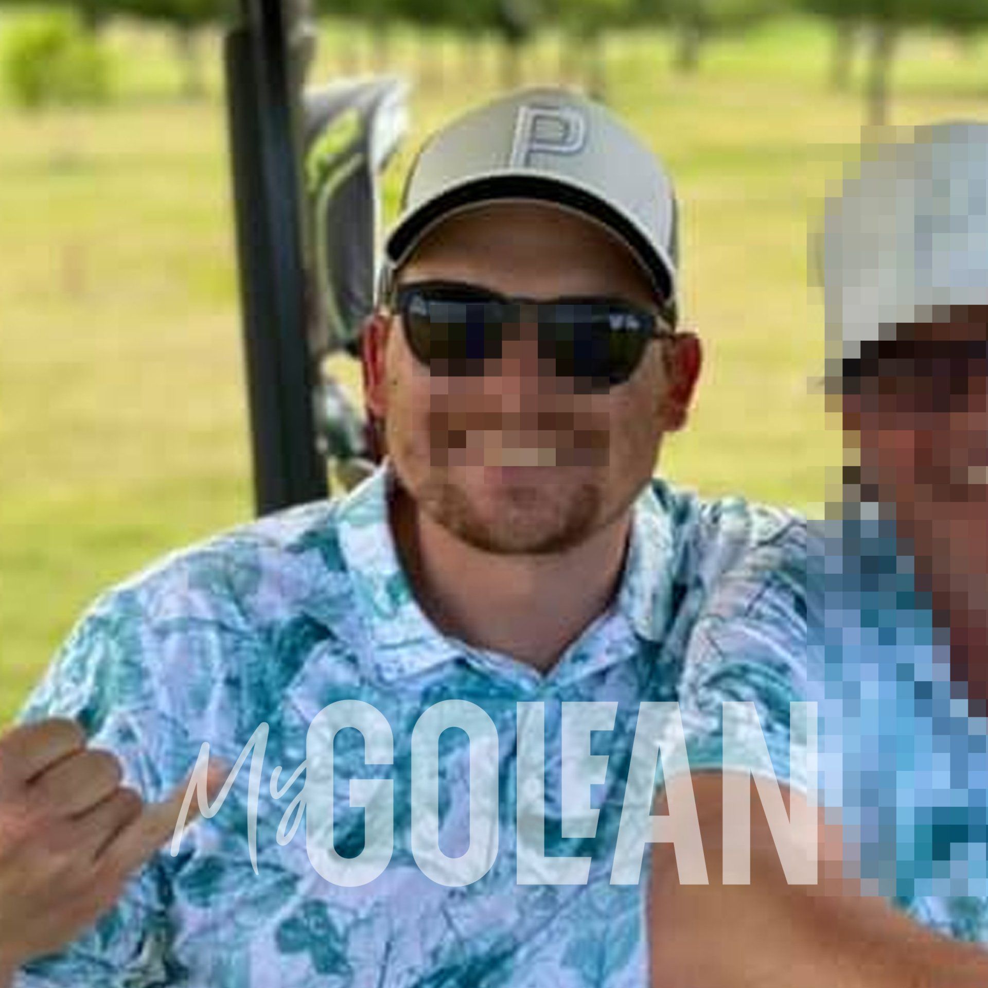 A man wearing sunglasses and a hat is sitting in a golf cart.