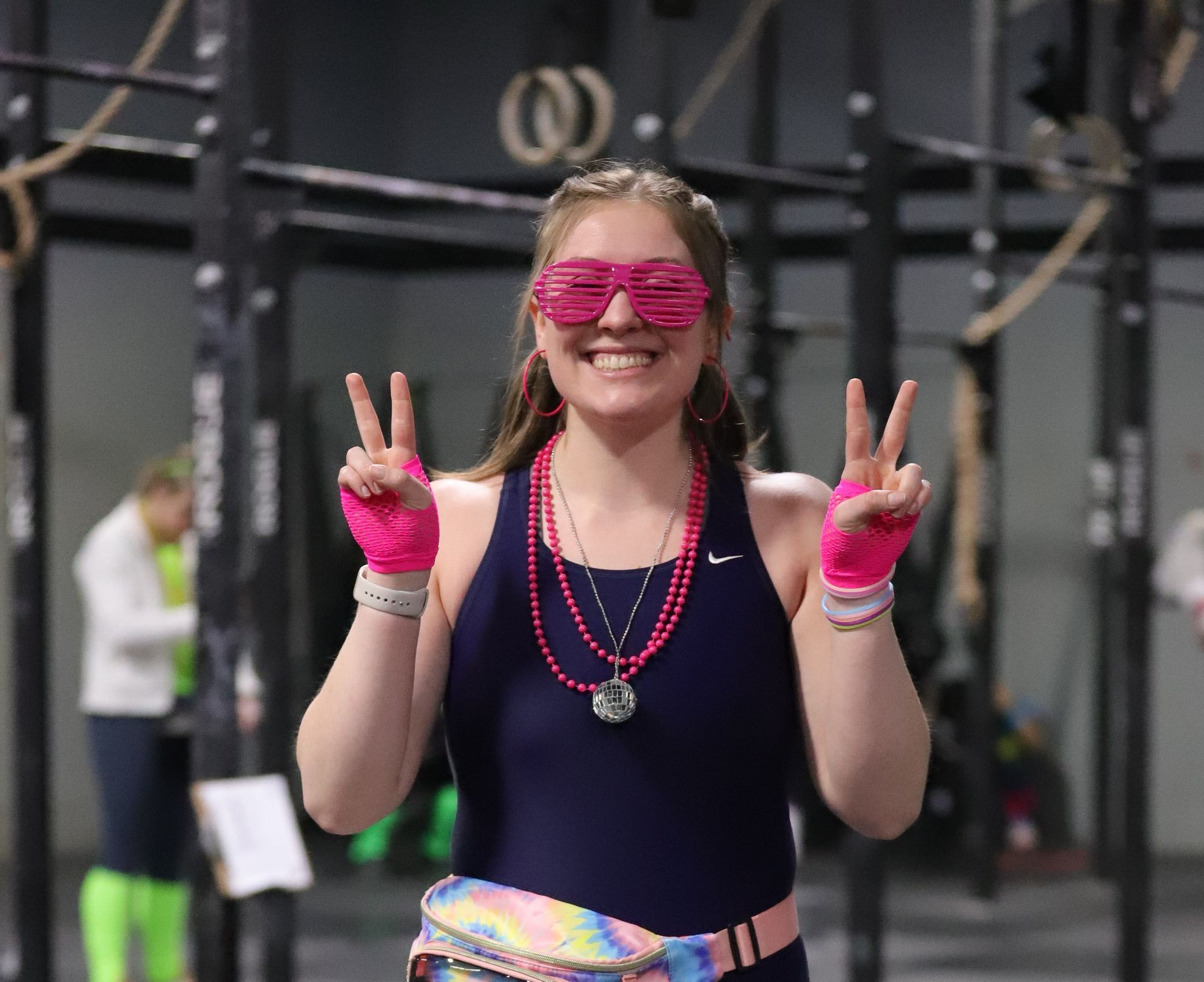 A happy, smiling girl ready for a workout.