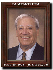 Memorial portrait of a smiling man in a brown frame, with “In Memorium” and dates May 19, 1924–June 11, 2006.