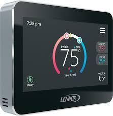 Lennox smart thermostat display showing 75° inside and 65° outside on a dark screen