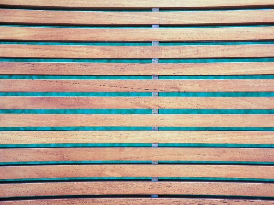 Close-up of a horizontal slatted fence panel