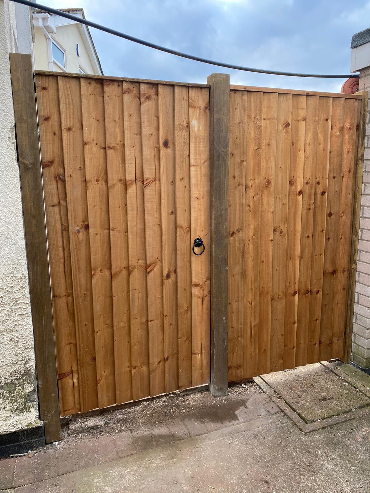 large wooden side gates to house in Cardiff
