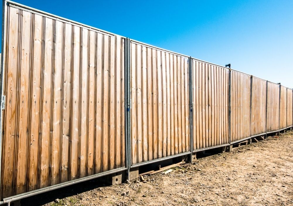 Wooden temporary building site hoarding in Cardiff