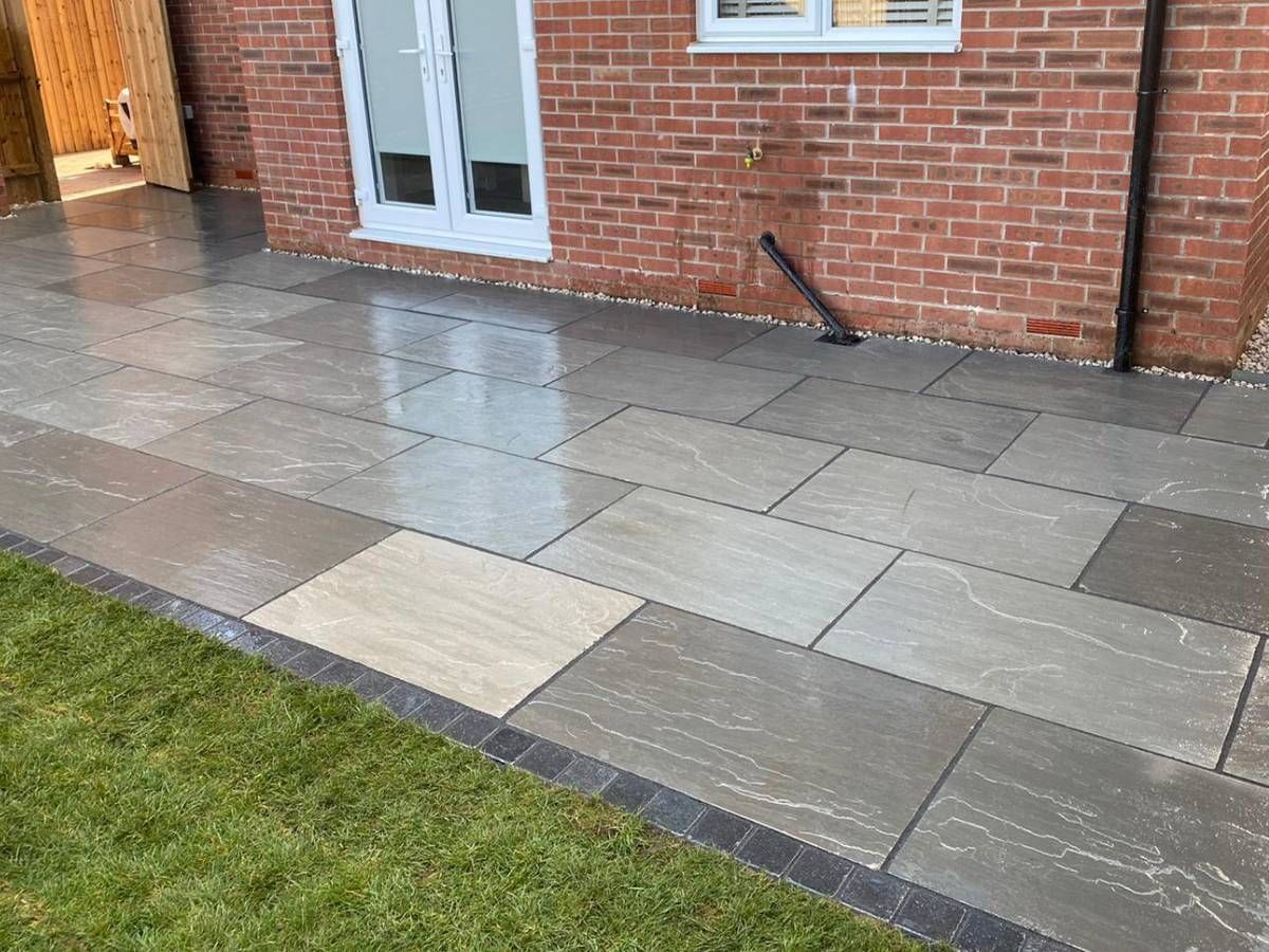 J&Z Fencing Barry grey paving to provide a back garden patio