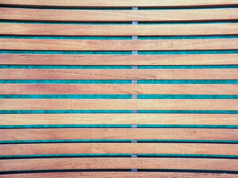 Close-up of a horizontal slatted fence panel