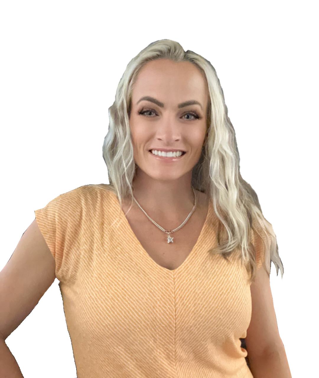 Smiling woman with wavy blonde hair wearing a peach top against a white background