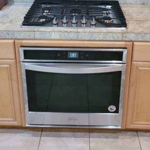 A stainless steel oven with the number 101 on it