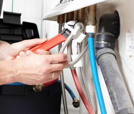 plumber checking what materials needed