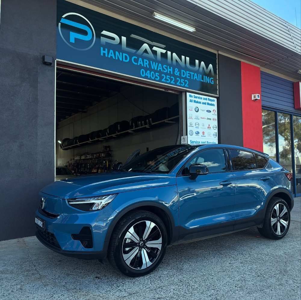 A Blue Car is Parked in Front of Platinum Hand Car Wash and Detailing — Platinum Hand Car Wash & Detailing in Belconnen, ACT