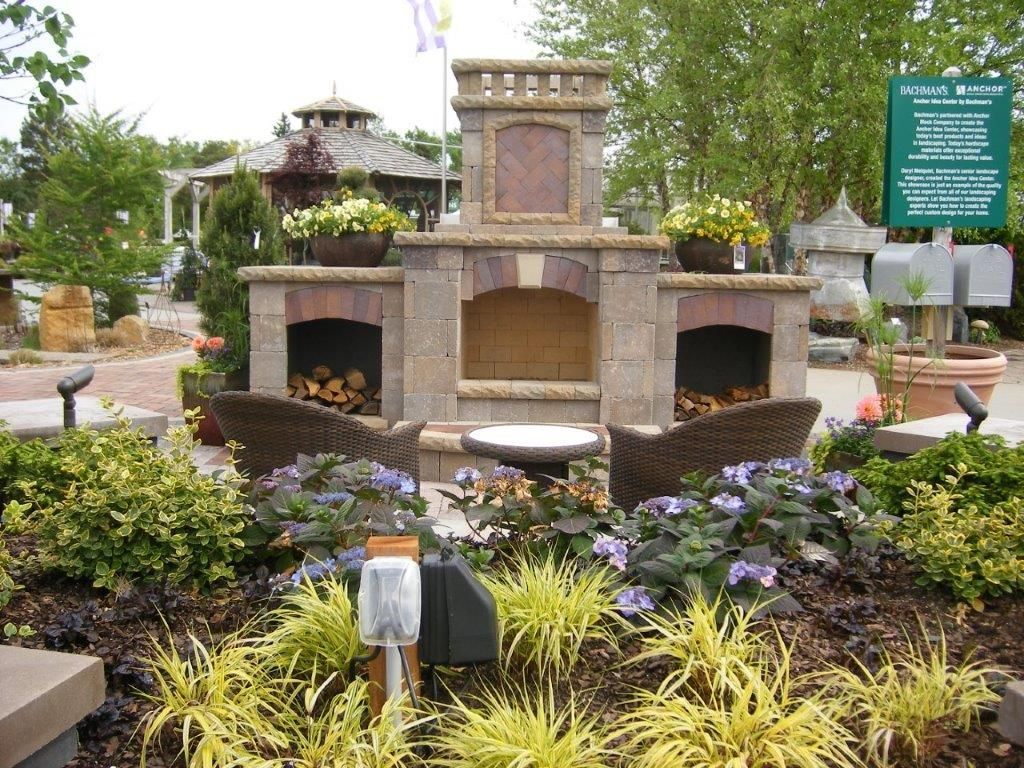 outdoor kitchen and fireplace