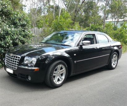 Black Car Parked Outside — Urangan, QLD — Jeeepart Recyclers Black Car Parked Outside — Urangan, QLD — Jeeepart Recyclers