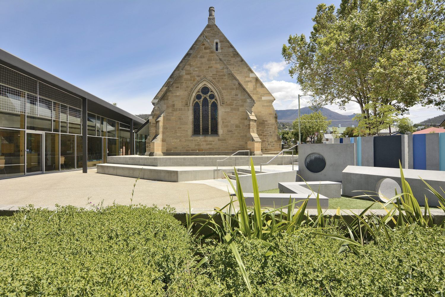 There Is A Church In The Background And A Sculpture In The Foreground – Cambridge, TAS - Bennett Construction (TAS)