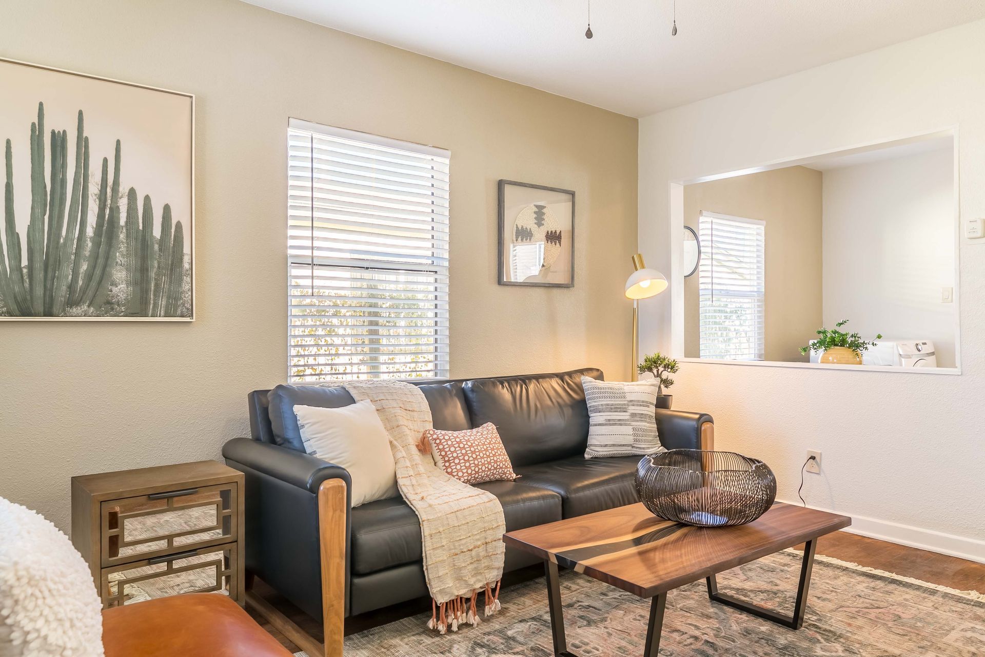 A living room with a couch and a coffee table