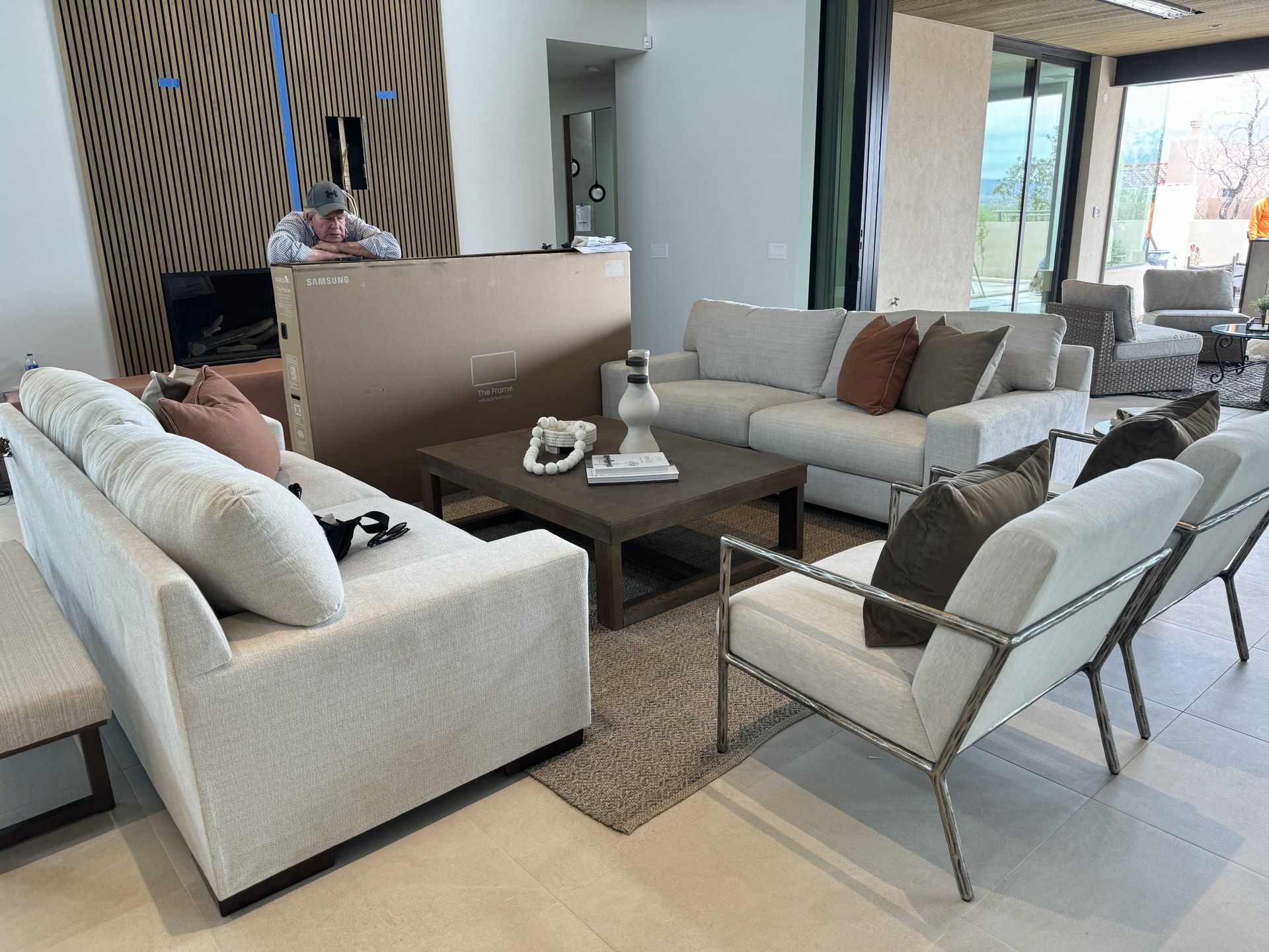 A living room with a lot of furniture and a table