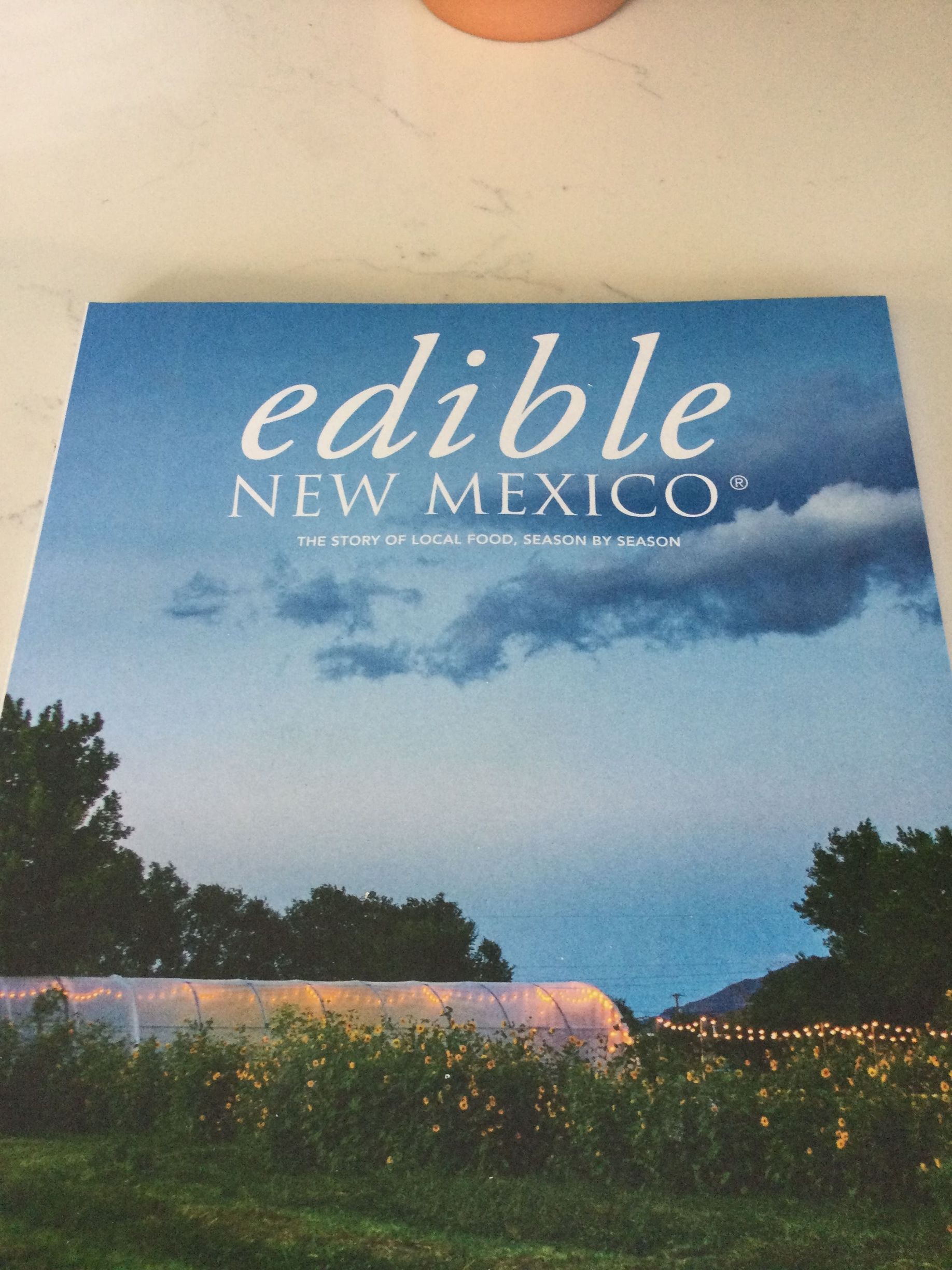 A book titled edible new mexico is on a table