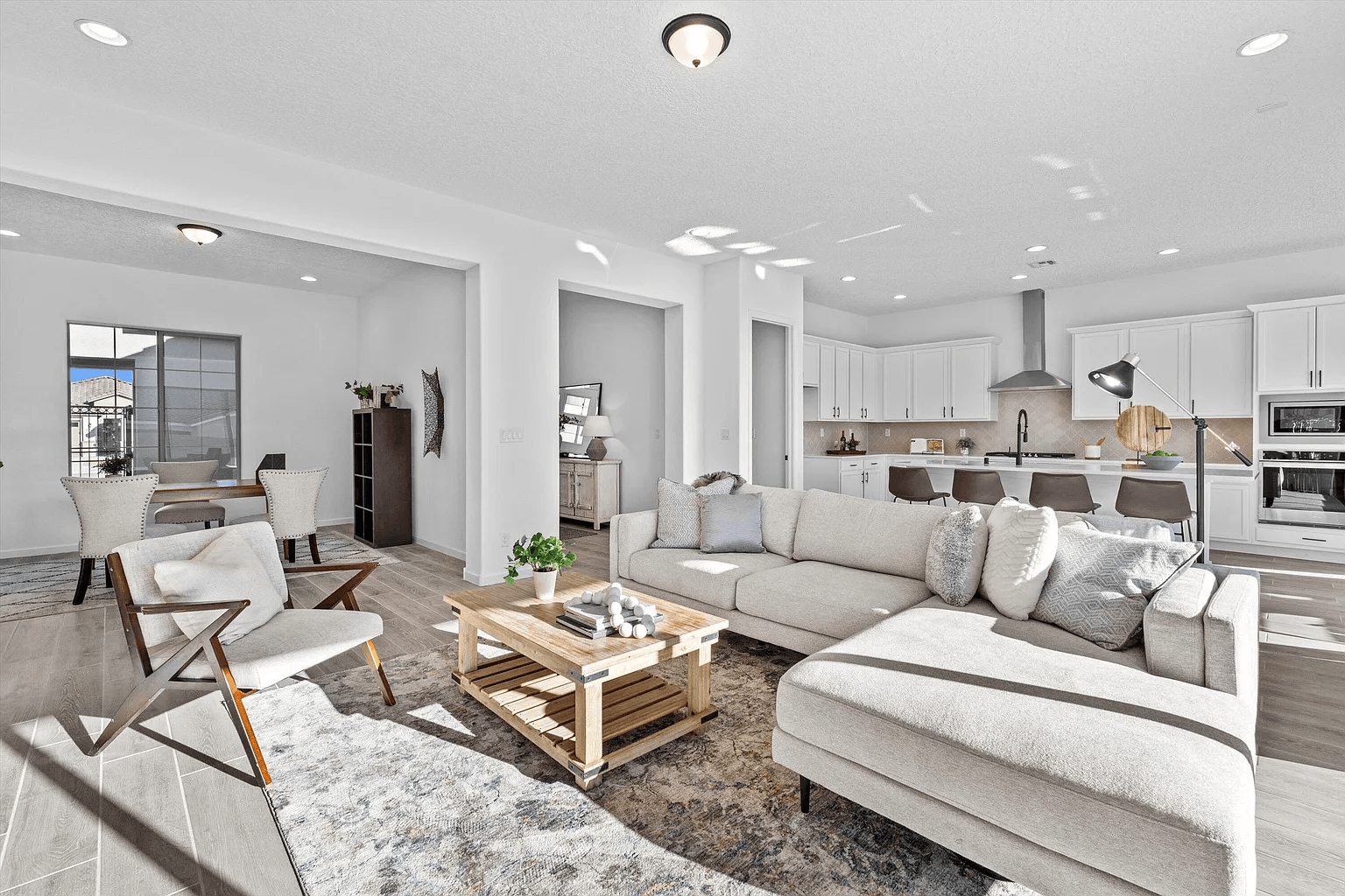 A living room filled with furniture and a coffee table.
